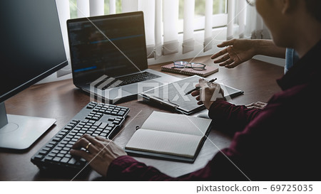 Programmer working in a software development and coding technologies. Website design. Technology concept. 69725035