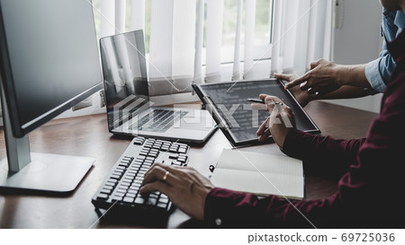 Programmer working in a software development and coding technologies. Website design. Technology concept. 69725036