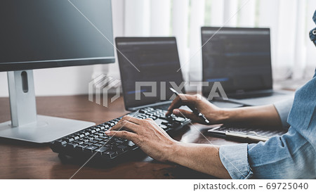 Programmer working in a software development and coding technologies. Website design. Technology concept. 69725040