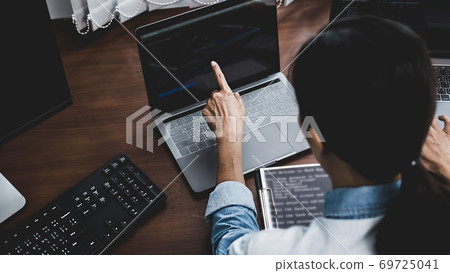 Programmer working in a software development and coding technologies. Website design. Technology concept. 69725041