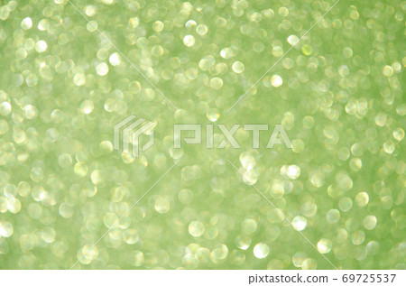 green defocused glitter lights background. Rounded defocused lights. Abstract bokeh background with copy space and text place green defocused glitter lights background. Rounded defocused lights. Abstract bokeh background with copy space and text place 69725537