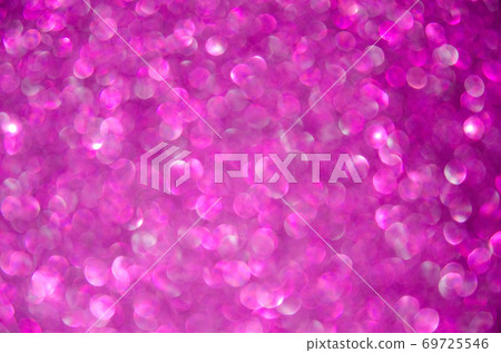 Purple defocused glitter lights background. Rounded defocused lights. abstract bokeh background with copy space and text place. Purple defocused glitter lights background. Rounded defocused lights. abstract bokeh background with copy space and text place. 69725546