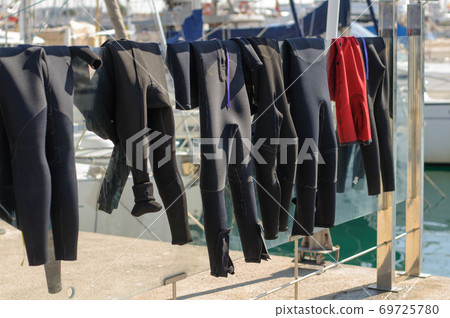 Surf suits dry in the sun 69725780
