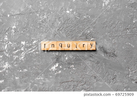 inquiry word written on wood block. inquiry text on table, concept inquiry word written on wood block. inquiry text on table, concept 69725909