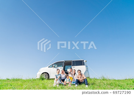 Three generations family, blue sky, travel, sitting 69727190