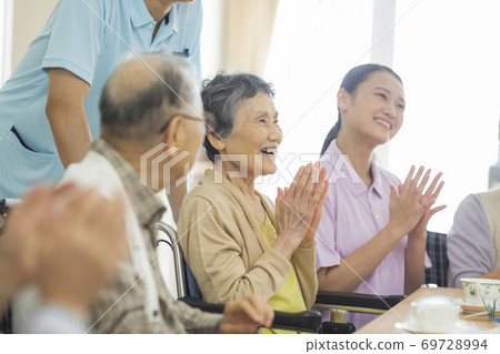 Senior women and senior men living in nursing homes 69728994