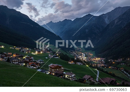 Valley evening in Austrian Alps 69730063