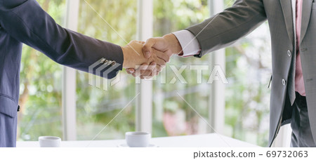 Sustainable Partner trust mission of ecosystem plant business holding green plant together symbolism Sustainable Partner trust mission of ecosystem plant business holding green plant together symbolism 69732063