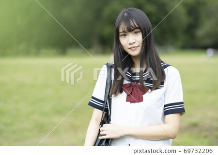 A high school girl with a serious face (serious and dignified) A high school girl with a serious face (serious and dignified) 69732206