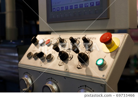 CNC machining center control panel close up CNC machining center control panel close up 69733466