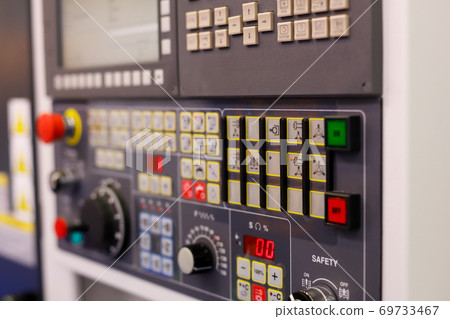 CNC lathe control panel close up CNC lathe control panel close up 69733467