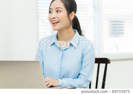 Business woman working Business woman working 69733973
