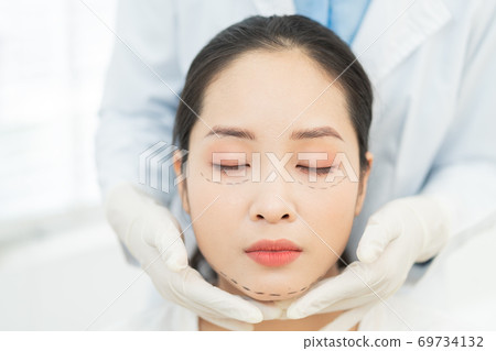 Woman cosmetic surgery Woman cosmetic surgery 69734132