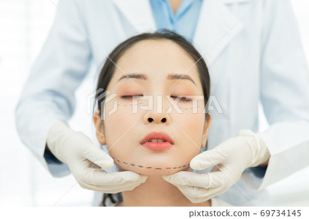 Woman cosmetic surgery 69734145