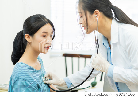 Woman, doctor, clinic 69734160