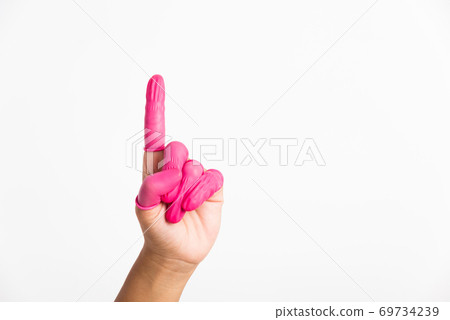 Woman hand wearing pink finger cots rubber 69734239