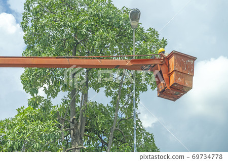 Orange Cranes to repair Cord, Repair street light Orange Cranes to repair Cord, Repair street light 69734778