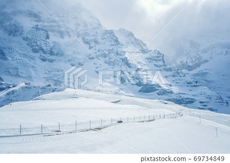 Aerial view of the Alps mountains in Switzerland. 69734849