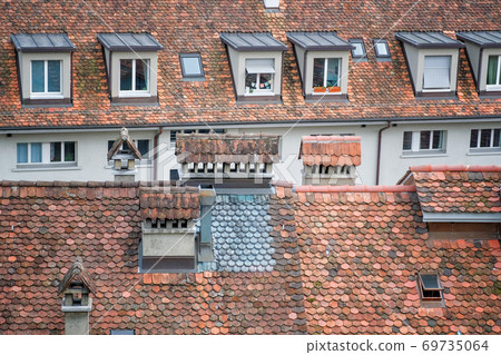 Roof top view of vintage urban housing in bern Switzerland Roof top view of vintage urban housing in bern Switzerland 69735064