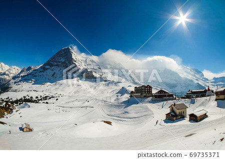 Kleine Scheidegg station, along the railway from Interlaken to Jungfraujoch at Switzerland Kleine Scheidegg station, along the railway from Interlaken to Jungfraujoch at Switzerland 69735371