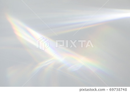 shadow and light caustic effect on a white wall 69738748