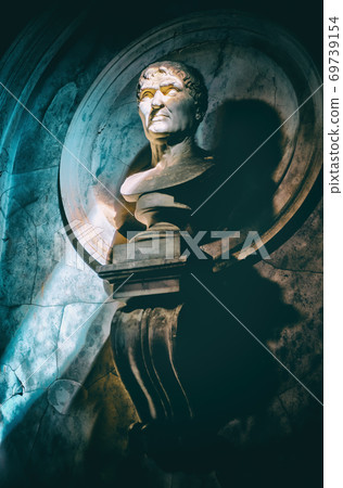 half-length statue portrait vertical background in the dark with sunray filter through the shadows half-length statue portrait vertical background in the dark with sunray filter through the shadows 69739154