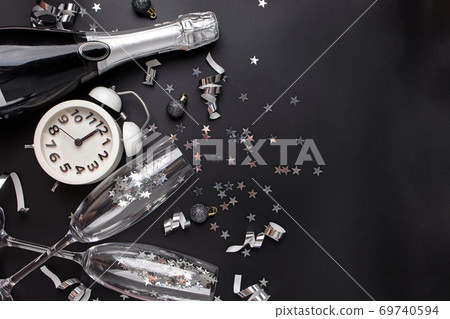 New Year Eve composition on black background. New Year Eve composition on black background. 69740594