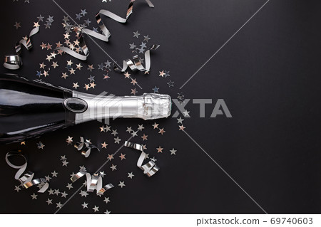 New Year Eve composition on black background. 69740603