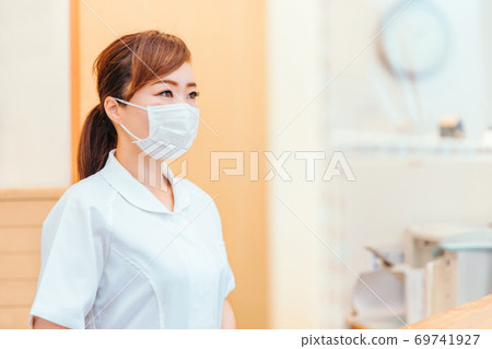 Asian female nurse with mask Asian female nurse with mask 69741927