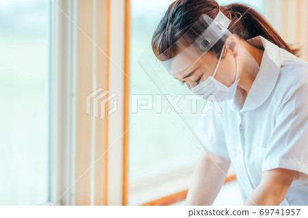 Unwell nurse Unwell nurse 69741957