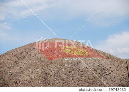 Kyrgyz flag on the mountain Kyrgyz flag on the mountain 69742983