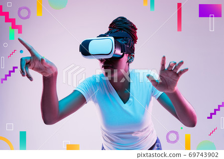 African woman's portrait isolated on bright, modern illustrated background. 69743902