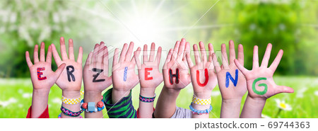 Children Hands Building Word Erziehung Means Education, Grass Meadow 69744363