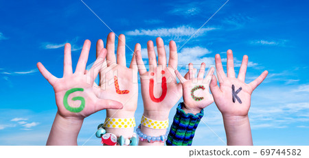 Children Hands Building Word Glueck Means Luck, Blue Sky 69744582