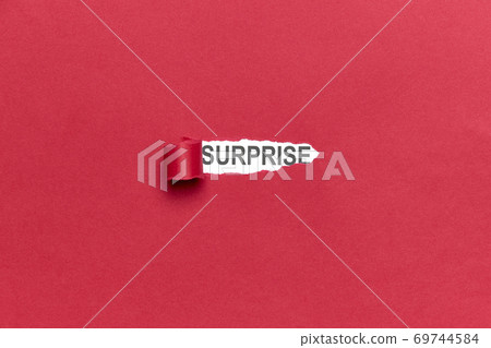 Red broken paper background with the word SURPRISE. Concept emotion 69744584
