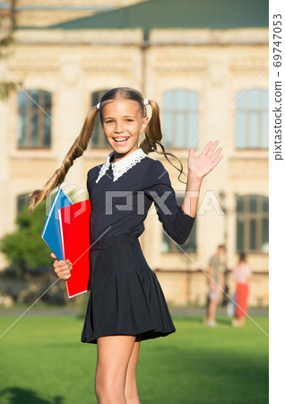 Perfect girl school student uniform hold books, language courses concept 69747053