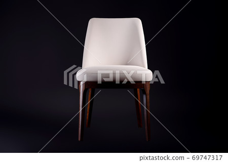 Beautiful comfortable chair with leather upholstery on a black background Beautiful comfortable chair with leather upholstery on a black background 69747317