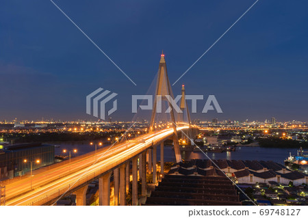 Aerial view of Bhumibol Bridge and Chao Phraya River in structure of suspension architecture concept, Urban city, Bangkok. Downtown area at night, Thailand. Aerial view of Bhumibol Bridge and Chao Phraya River in structure of suspension architecture concept, Urban city, Bangkok. Downtown area at night, Thailand. 69748127