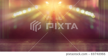wooden cross on stage with light rays in blurred bokeh background, christian worship in church wooden cross on stage with light rays in blurred bokeh background, christian worship in church 69748966