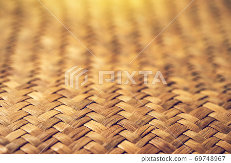 pattern of brown woven reed mat texture background, weave mat crafted used for floor. 69748967