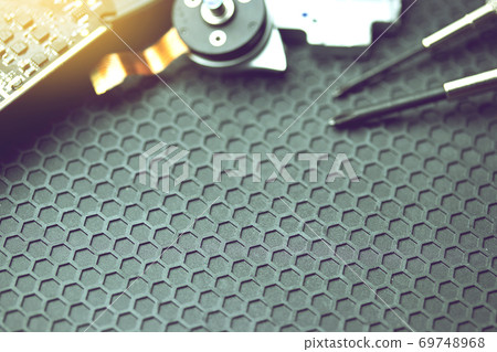 repair electronic equipment on dark background with copy space, repairing electronics concept 69748968