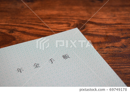 Pension notebook on the desk 69749178