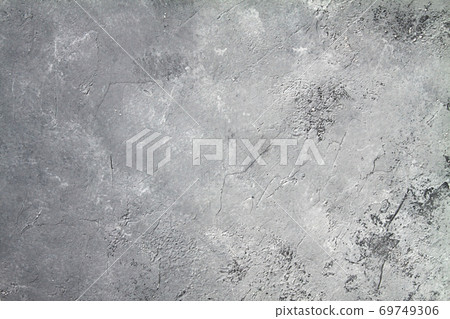 Concrete dark gray background with scuffs and black splashes. Textured wall texture in the grunge style. 69749306