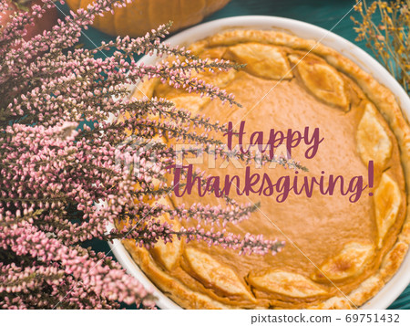 Thanksgiving flat lay with pumpkin pie Thanksgiving flat lay with pumpkin pie 69751432