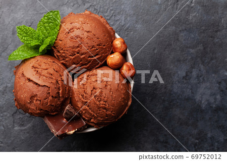 Chocolate with nuts ice cream scoops Chocolate with nuts ice cream scoops 69752012