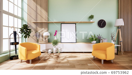 Cabinet wooden and yellow arm chair in Living green light wall interior japanese style. 3d rendering Cabinet wooden and yellow arm chair in Living green light wall interior japanese style. 3d rendering 69753962