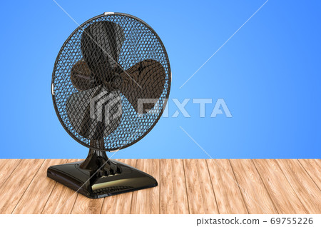 Table Fan on the wooden table. 3D rendering 69755226