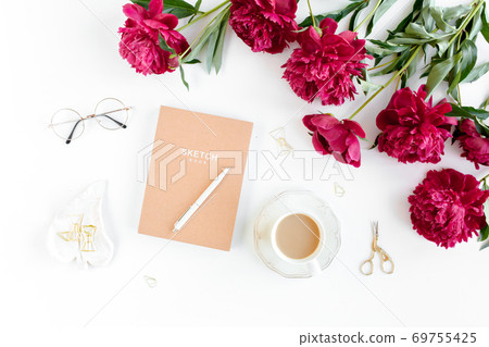 Workspace with diary, notebook, accessories, peony flowers on white background. Home office desk. Top view feminine background. Flat lay, top view Workspace with diary, notebook, accessories, peony flowers on white background. Home office desk. Top view feminine background. Flat lay, top view 69755425