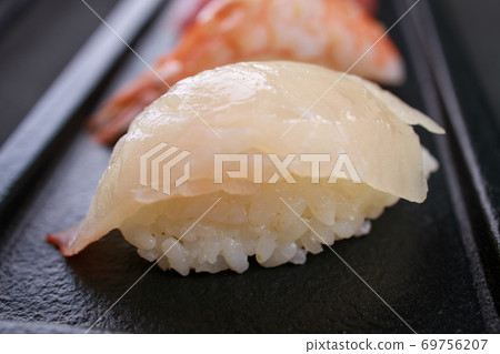 Nigiri sushi set on black plate, food background Nigiri sushi set on black plate, food background 69756207