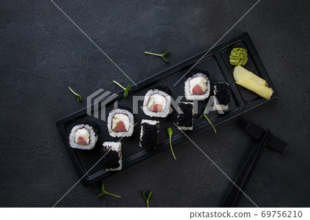 Sushi rolls with tuna and caviar, Japanese cuisine 69756210
